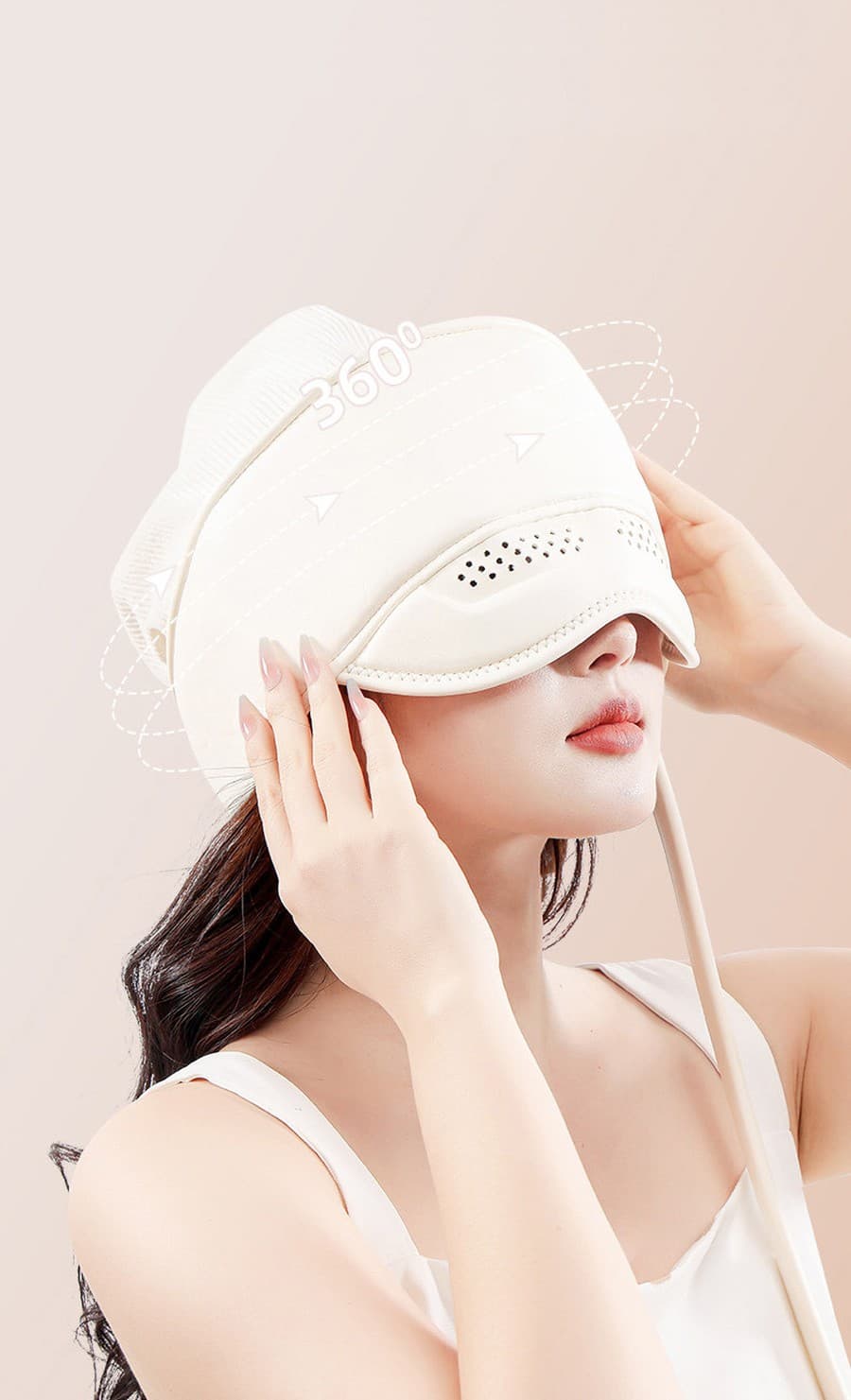 The Halo head massager wrapping 360 degrees around the head, from crown to eyes